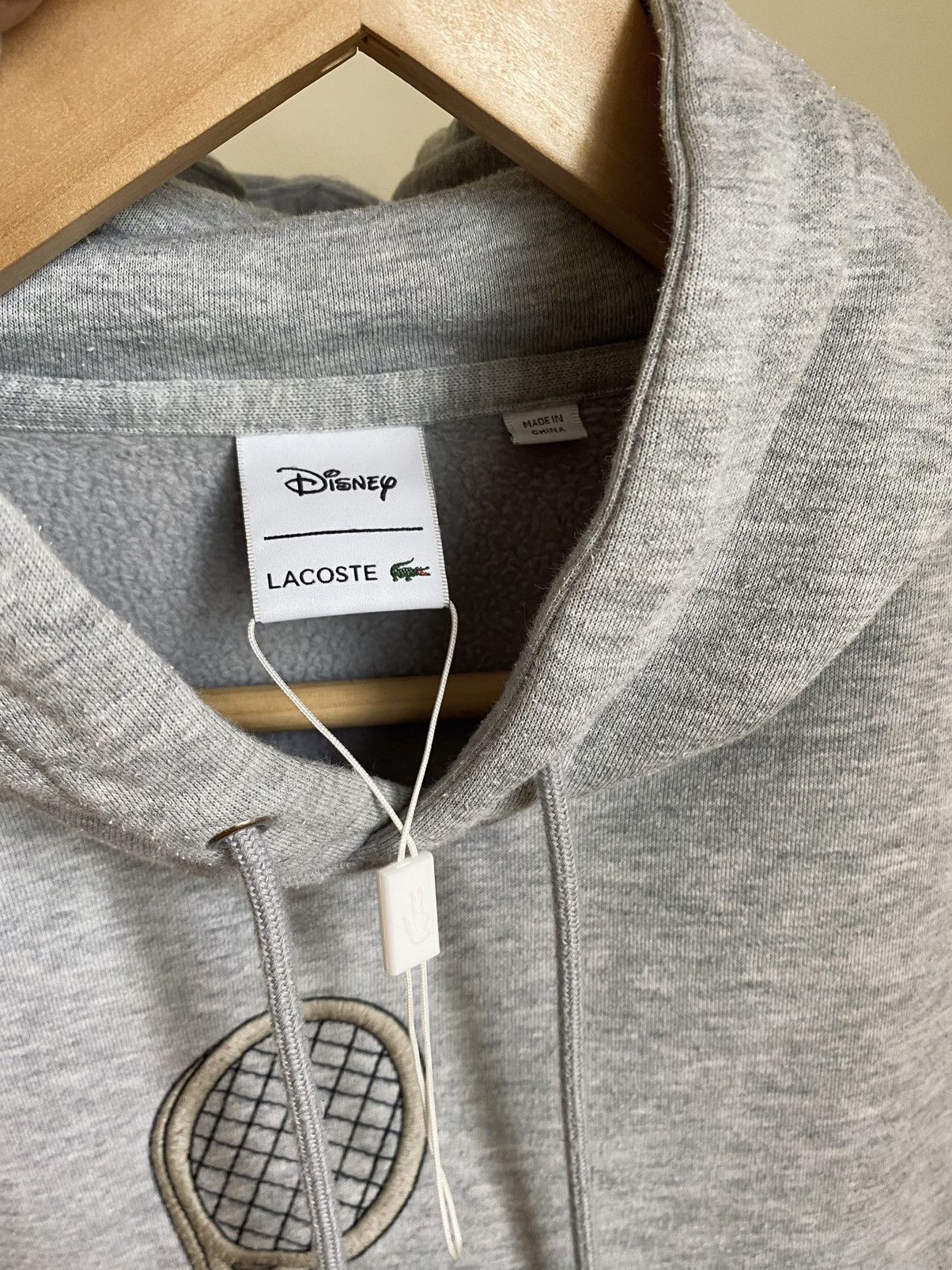 Mickey mouse tennis hot sale hoodie lacoste