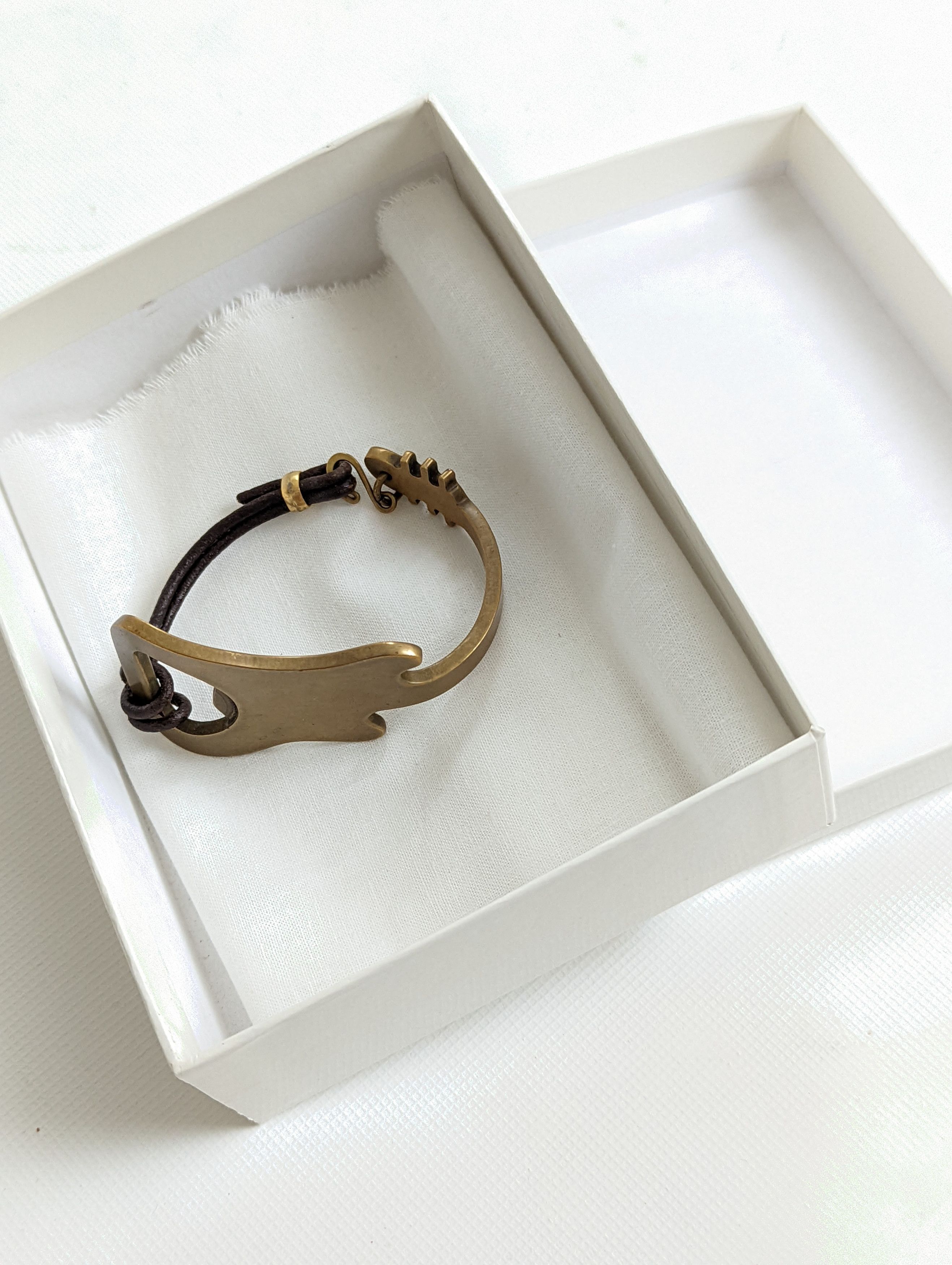 Maison Margiela 2007 guitar bottle opener bracelet | Grailed