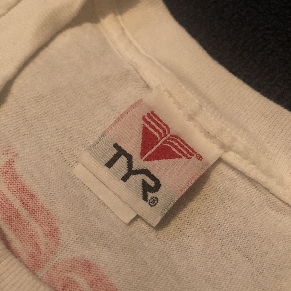 Vintage Vintage 1990s TYR Sport Victory! Fist All Over Print AOP Tee Size US L / EU 52-54 / 3 - 6 Thumbnail