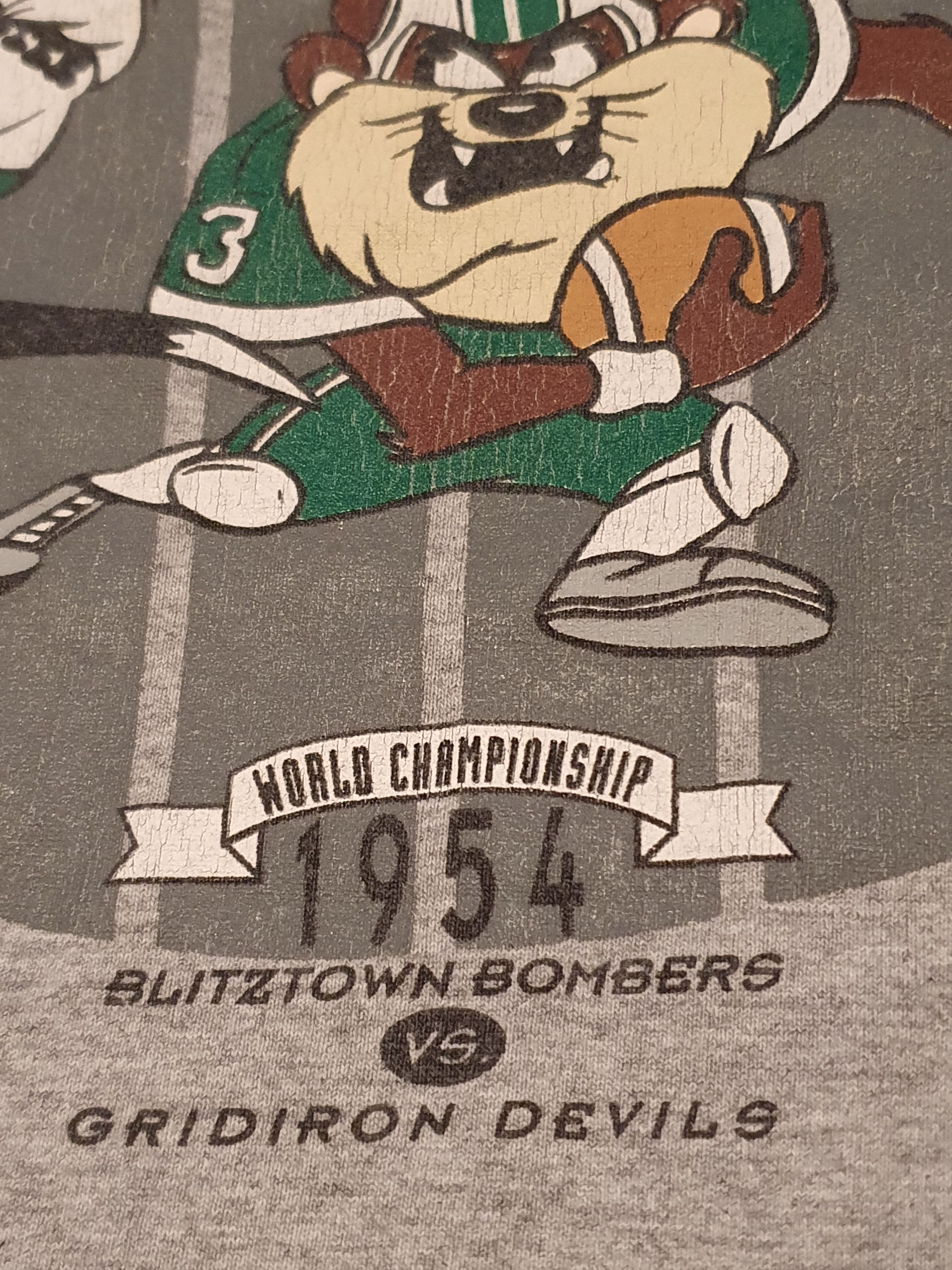 Acme Clothing × Vintage × Warner Bros Looney Bowl Warner Bros Vtg ACME Clothing Football Tee,sz L Size US L / EU 52-54 / 3 - 8 Thumbnail