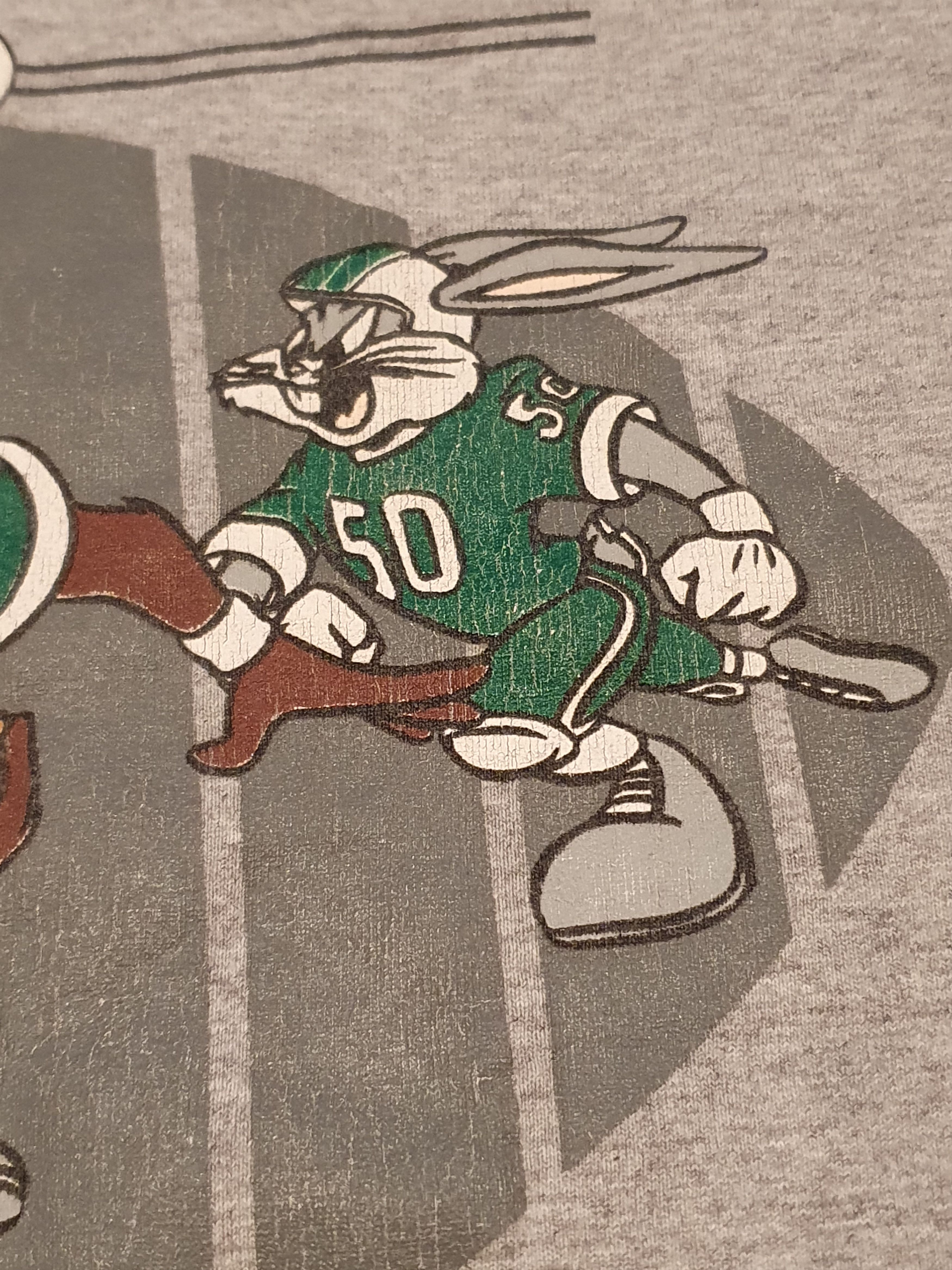 Acme Clothing × Vintage × Warner Bros Looney Bowl Warner Bros Vtg ACME Clothing Football Tee,sz L Size US L / EU 52-54 / 3 - 9 Thumbnail