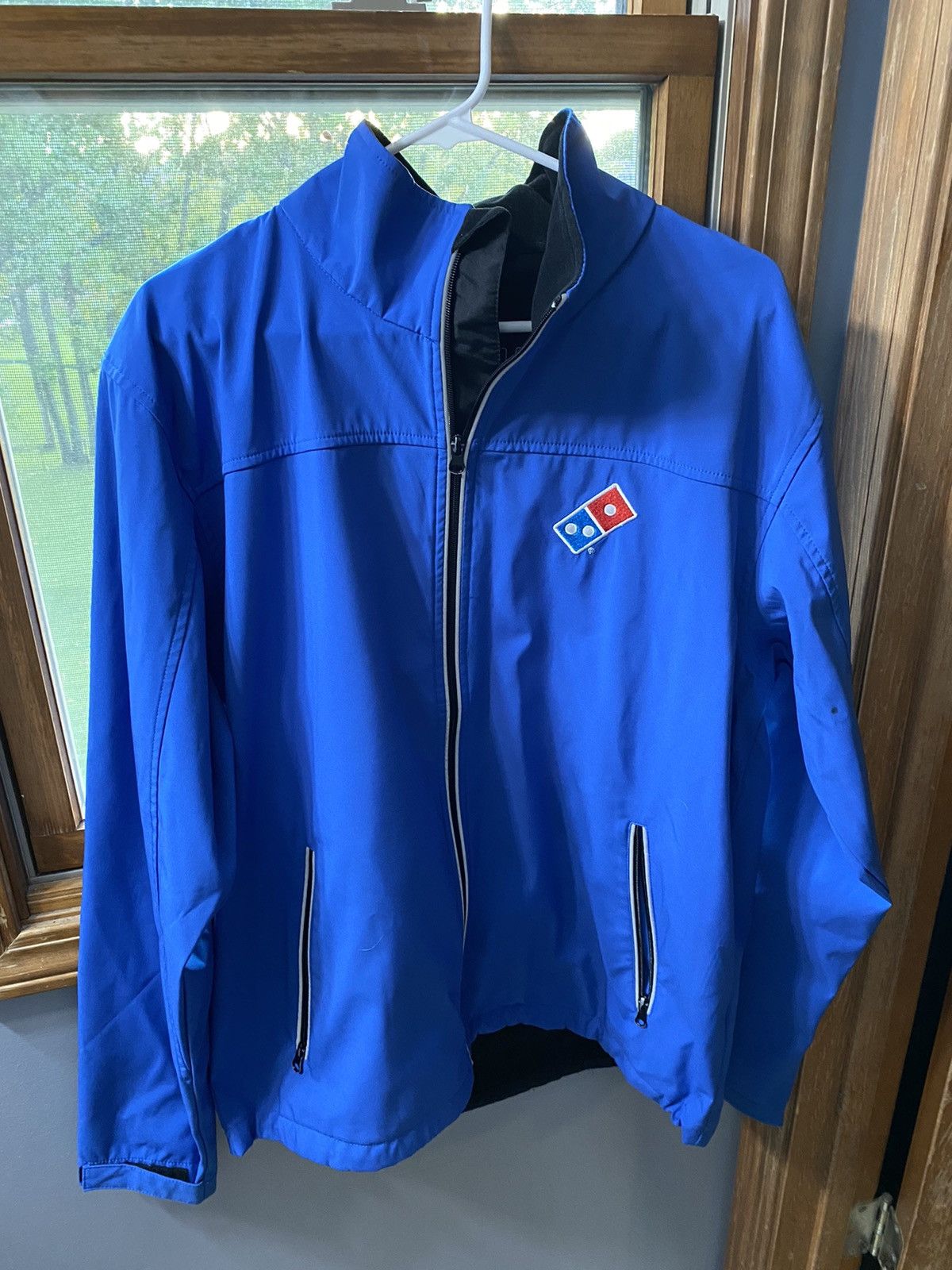 Domino's rain jacket online