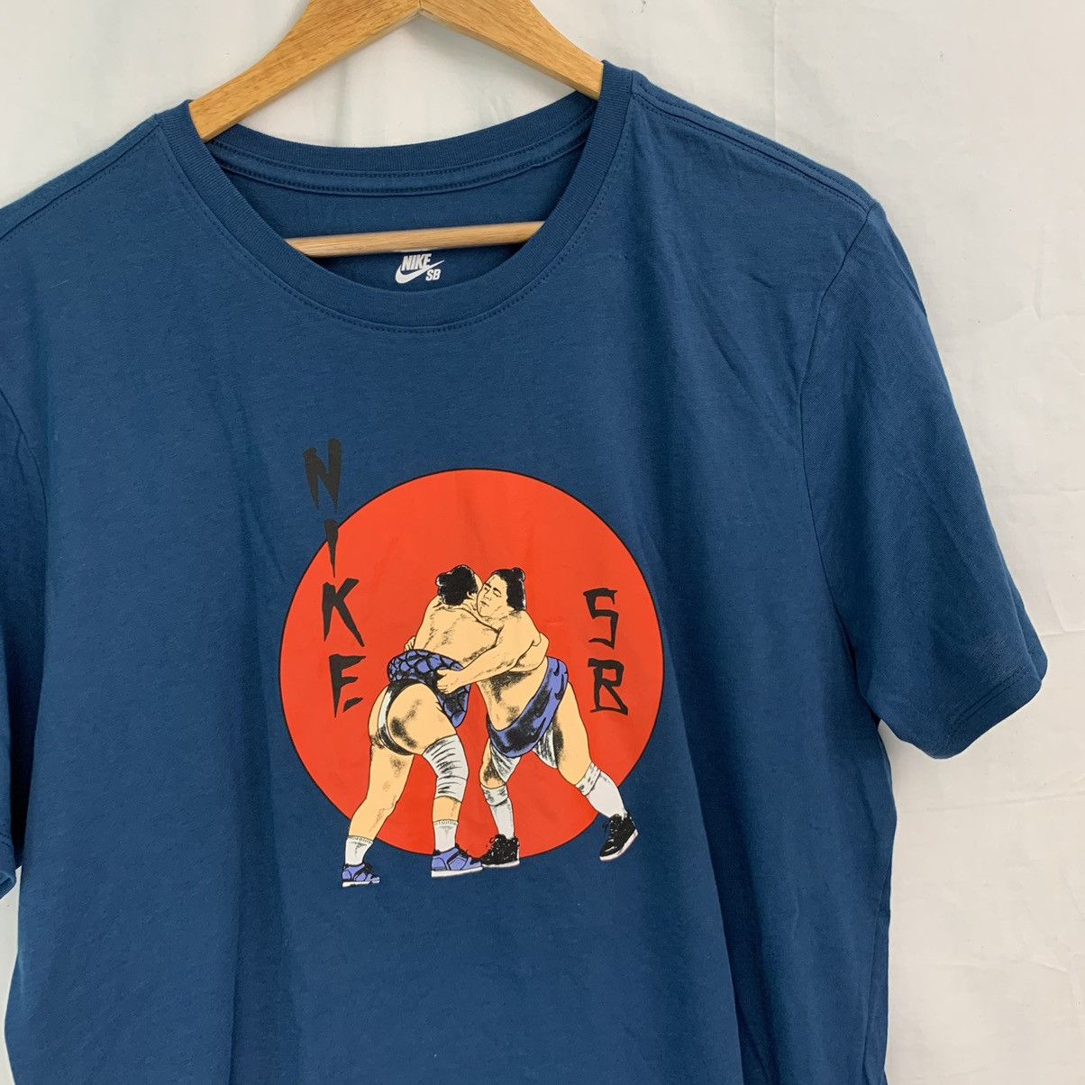 Nike sumo t shirt sales