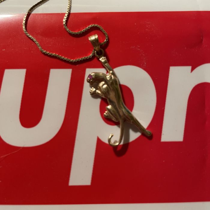 Supreme gold panther top chain