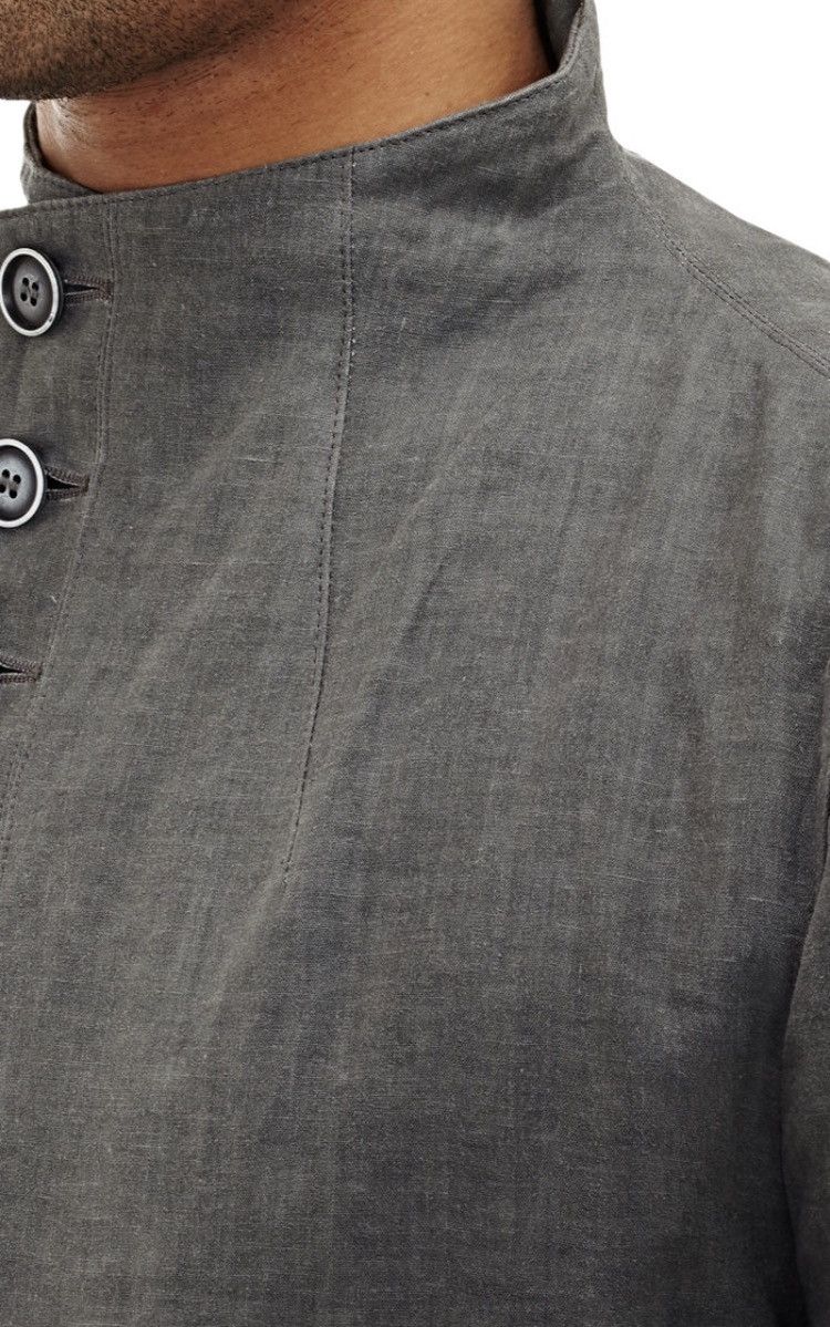 Multibutton cutaway jacket. 48