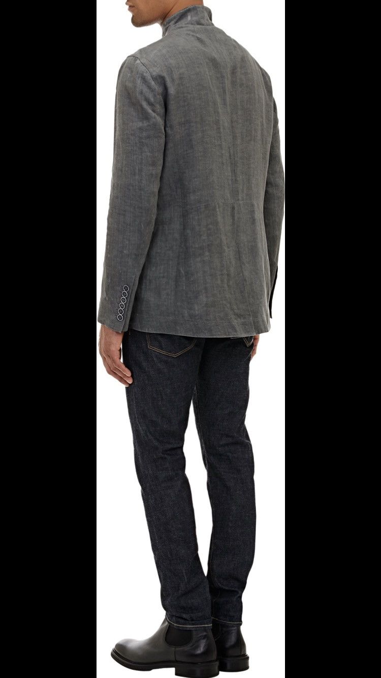 Multibutton cutaway jacket. 48