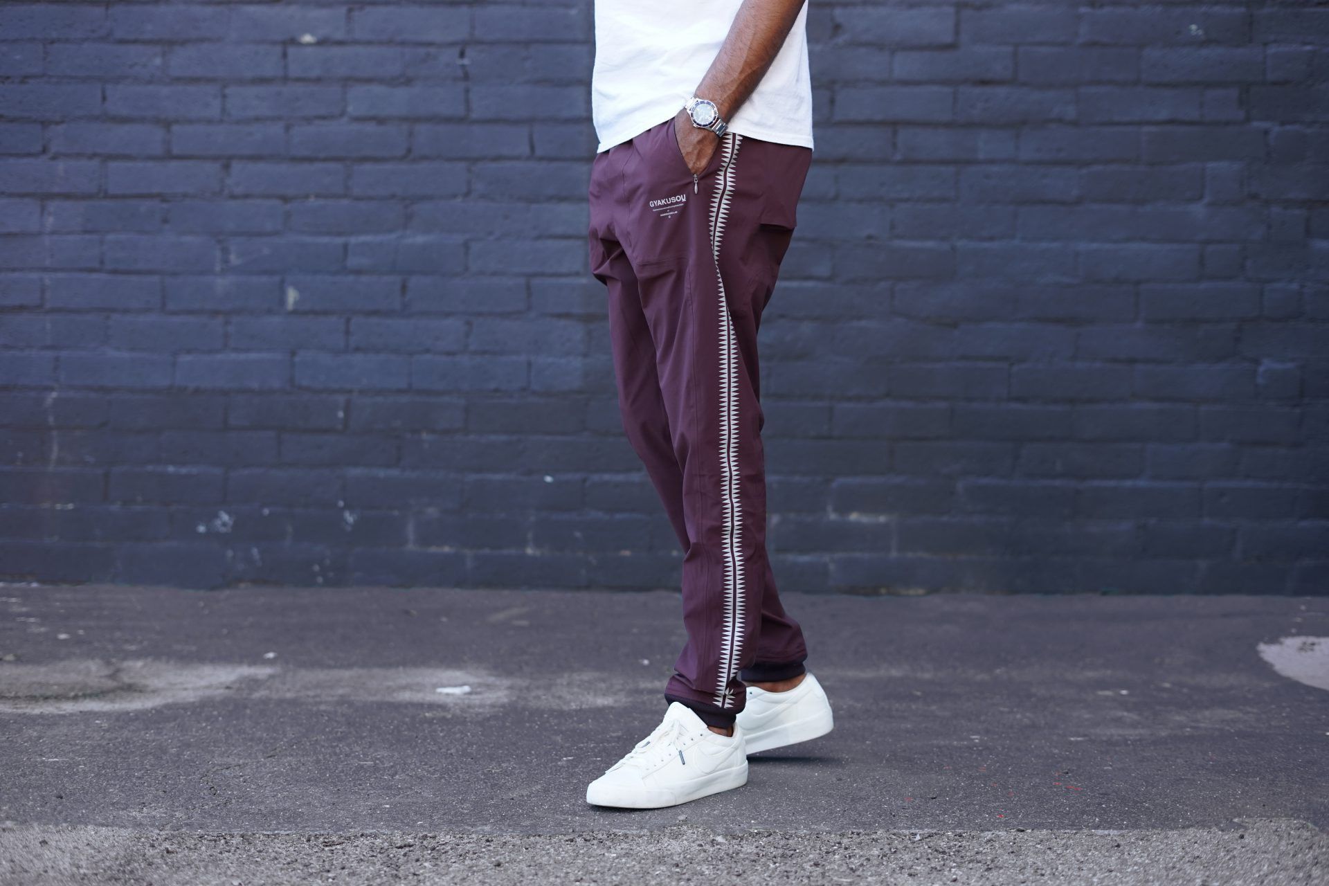 Nike x undercover gyakusou team track pant best sale