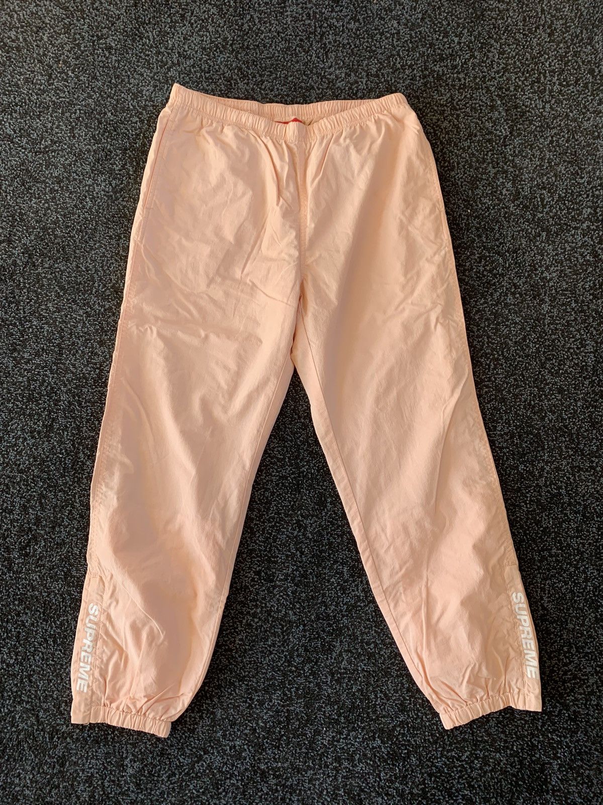 Supreme Supreme warm up pants - Peach | Grailed