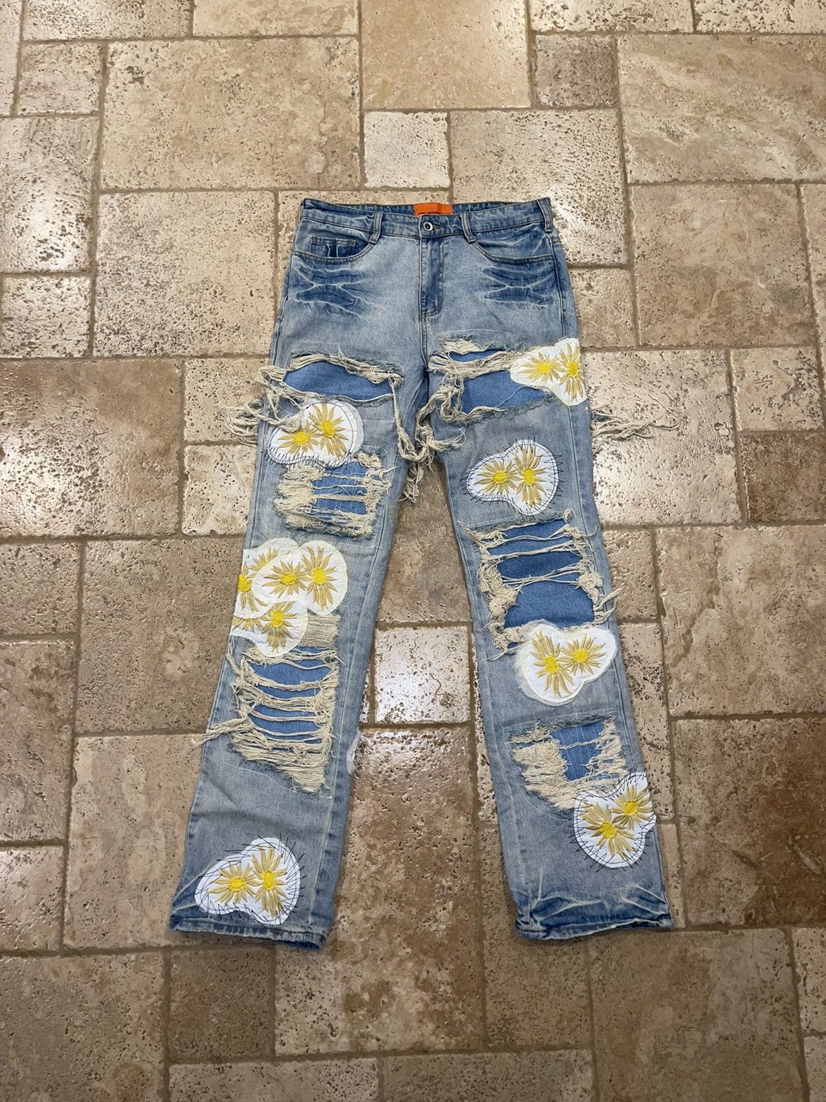 WHO DECIDES WAR Distressed Daisy Jeans 