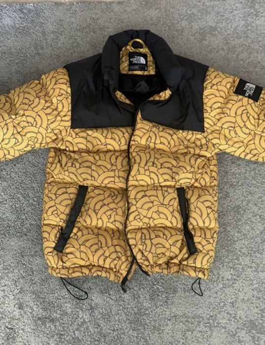 The north face 1992 nuptse jacket yellow hotsell dome print