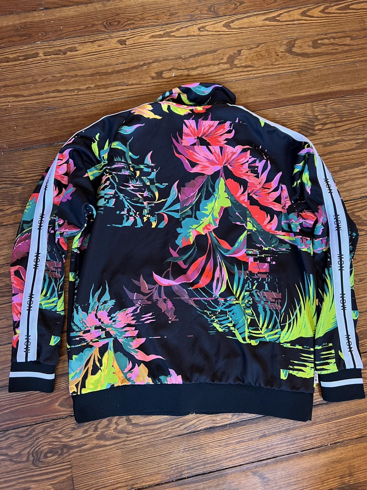 Nike floral track jacket deals
