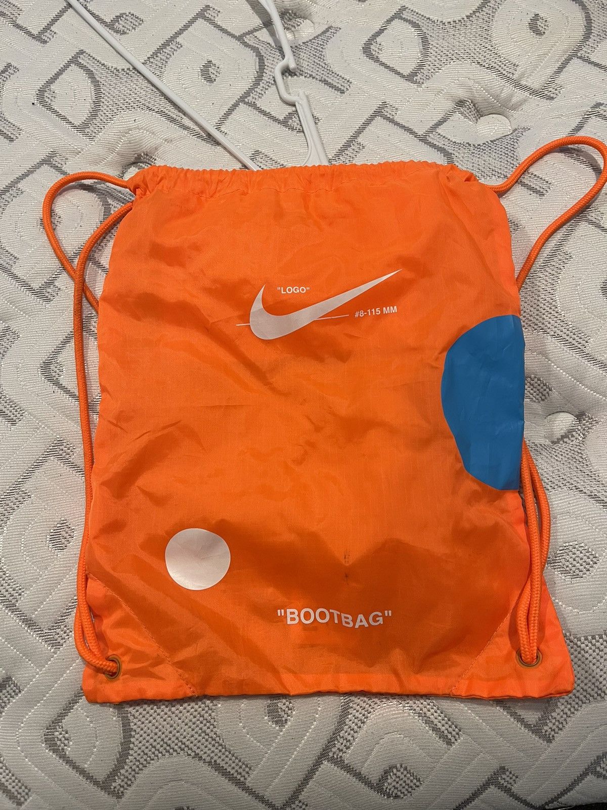 Off white nike drawstring bag online