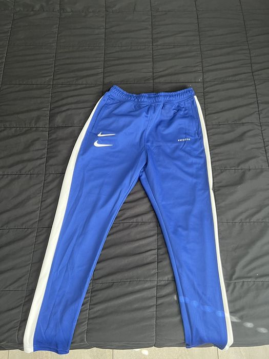 double swoosh track pants