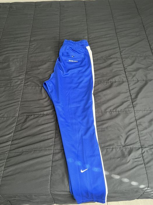 double swoosh track pants