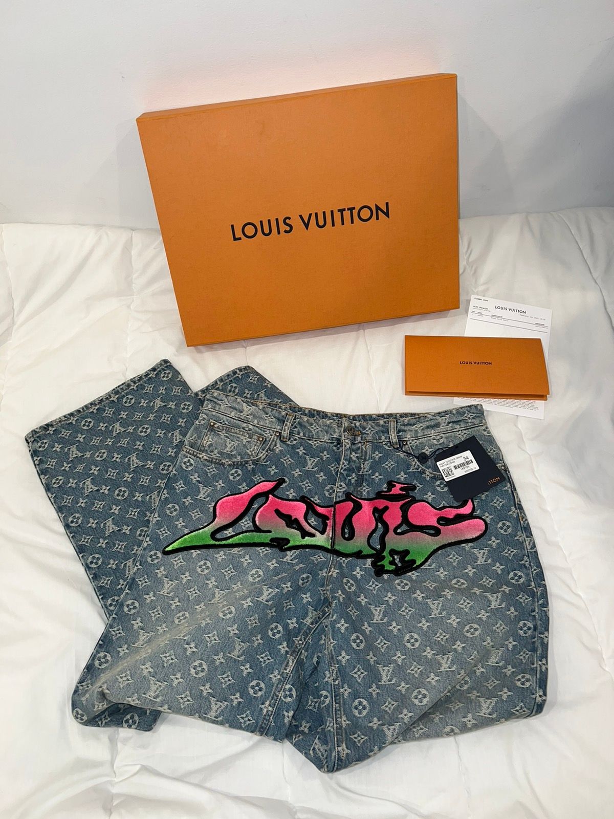 Shop Louis Vuitton Louis Vuitton LV GRAFFITI DENIM PANTS by