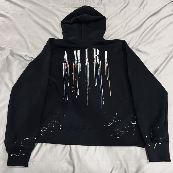 Black and white paint best sale drip hoodie