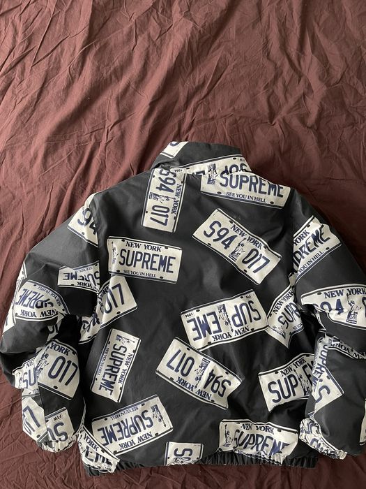 Supreme Supreme License plate puffer jacket | Grailed