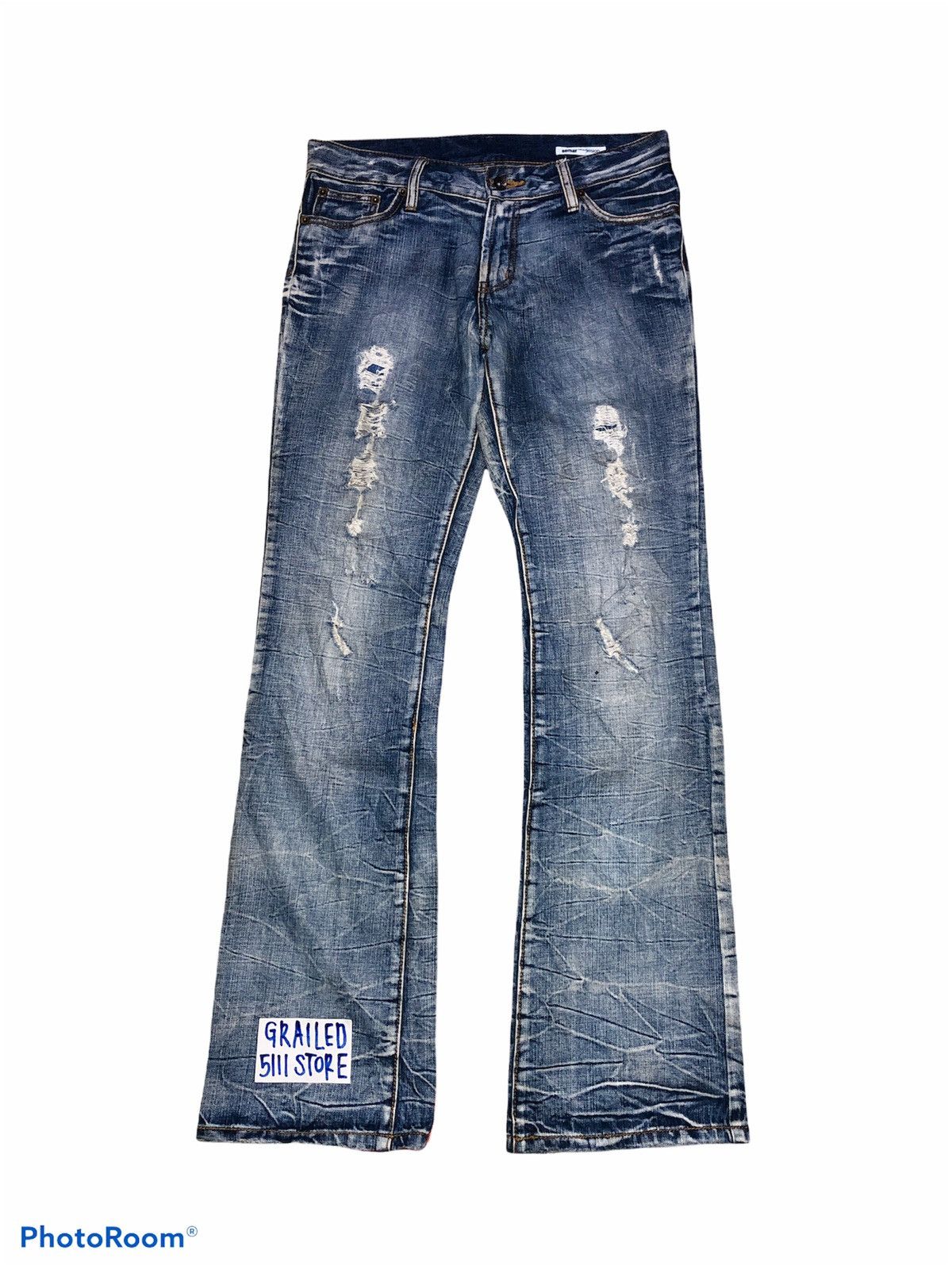 FLARED DISTRESSED DENIM BY SEMANTIC DESIGN