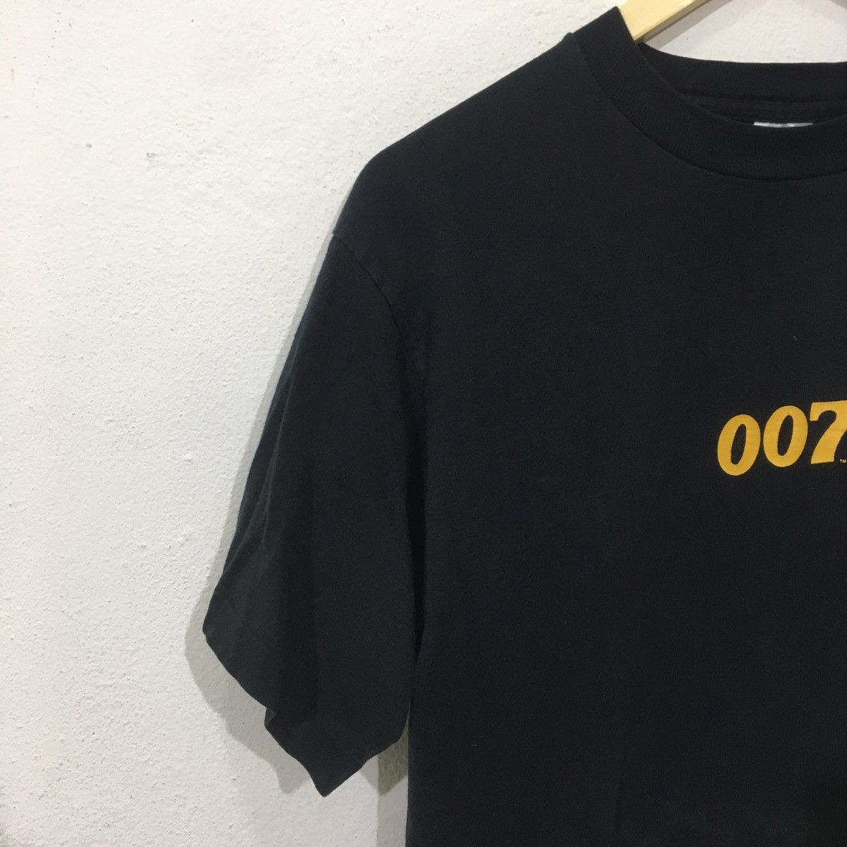 Vintage Vintage 90s James Bond 007 Goldeneye Action Tshirt Size US L / EU 52-54 / 3 - 7 Thumbnail