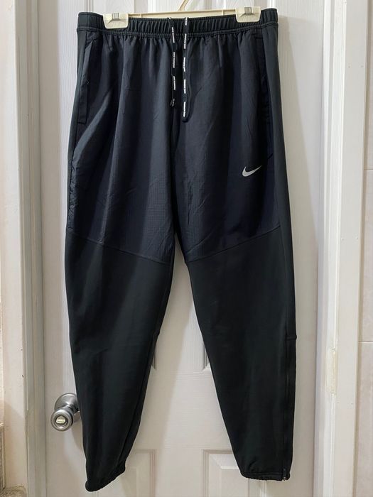 Nike therma essential store men's running pants