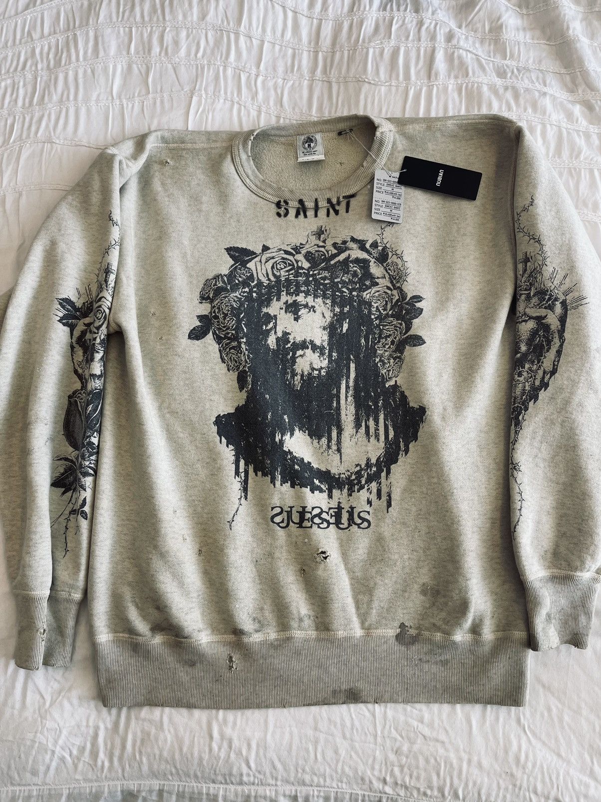 Saint Michael “Jesus” sweatshirt from SAINT Mxxxxxx X Kosuke