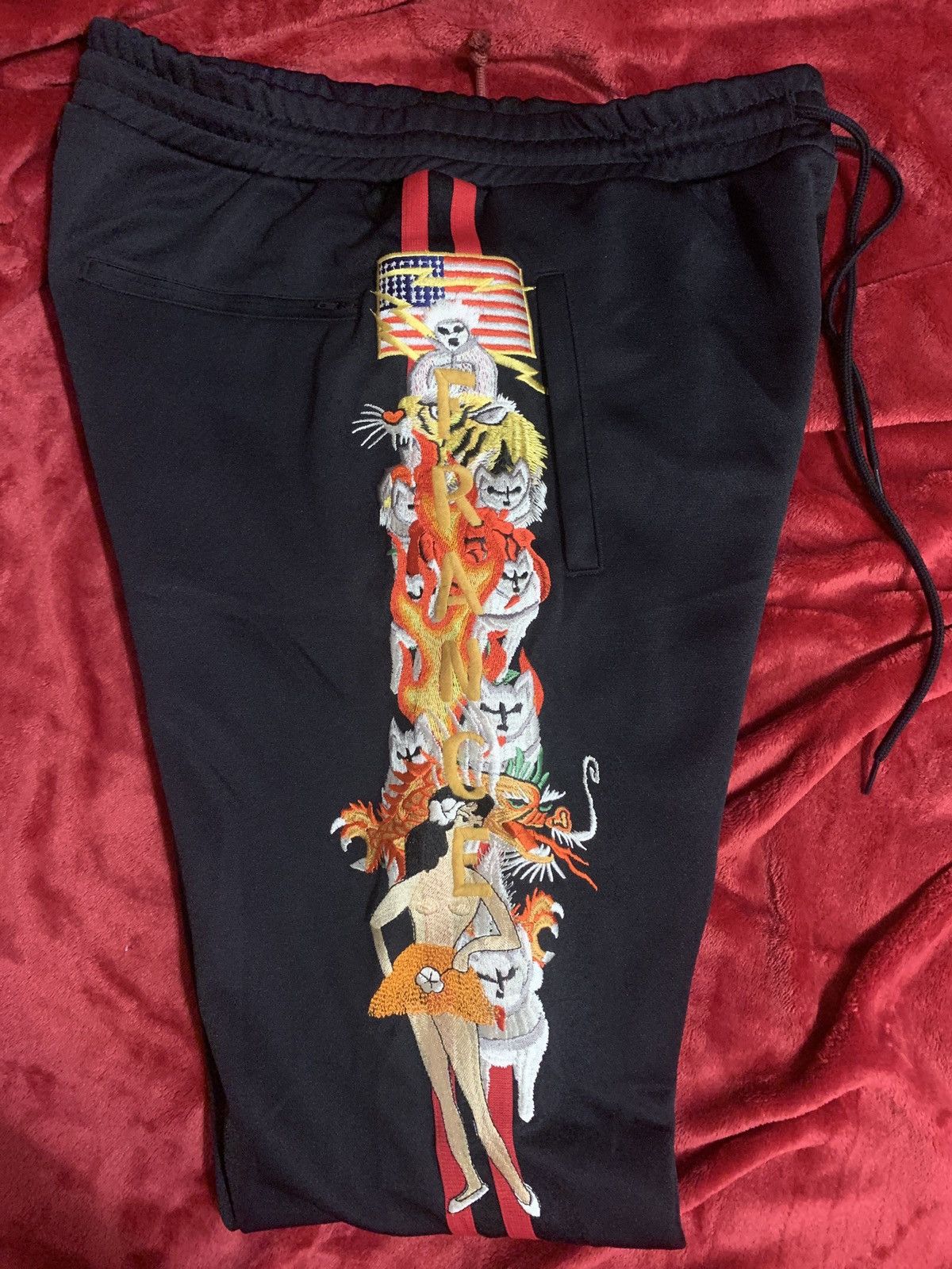 Doublet Doublet chaos embroidery track pants black and red | Grailed