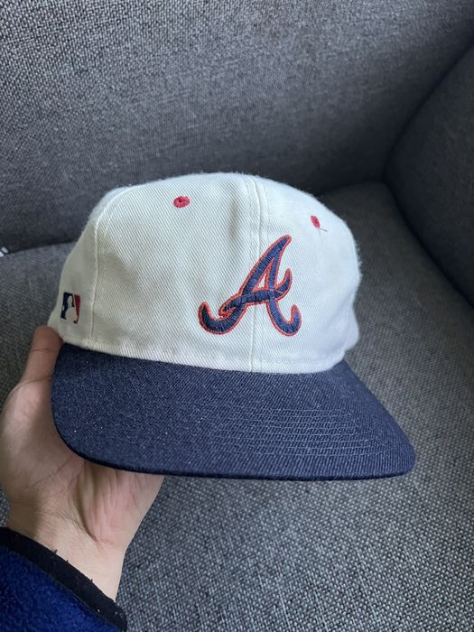 A-Wax(MC Eiht) wearing a Sports Specialties Atlanta Braves Vintage