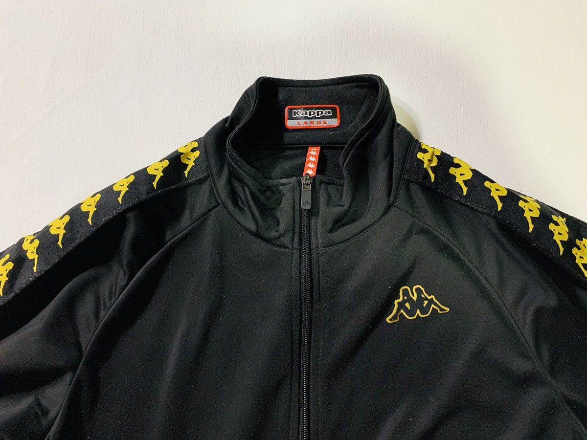 Kappa tracksuit black hot sale and gold