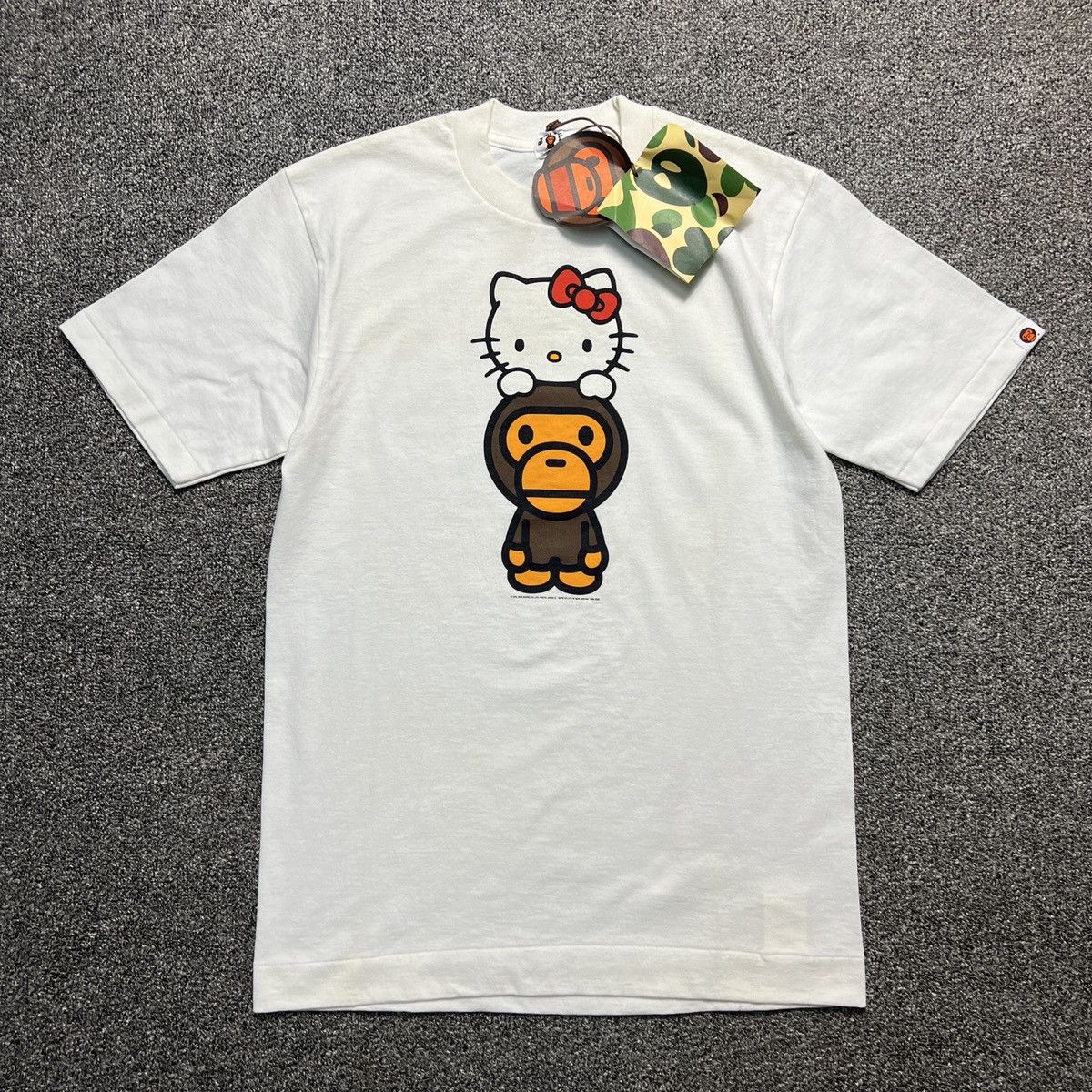 Bape × Nigo Vintage 2005 Baby Milo x Hello Kitty bape tee Bape × Nigo Vintage 2005 Baby Milo x Hello Kitty bape tee
