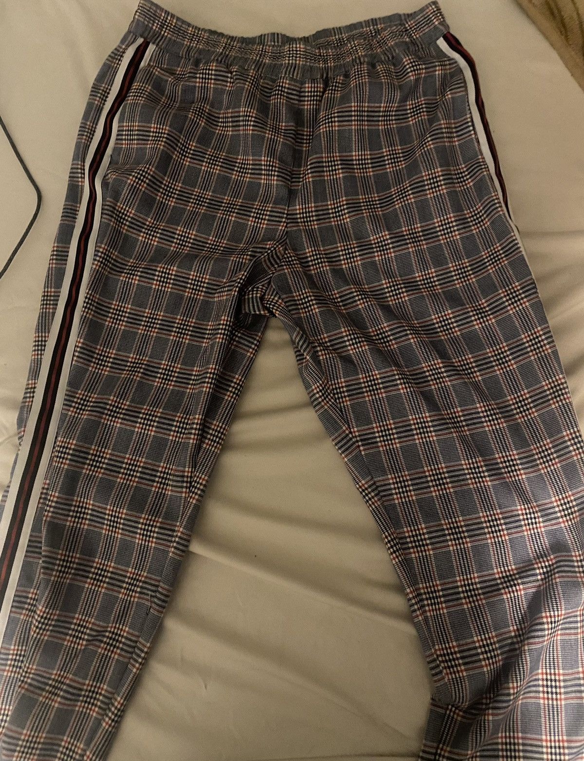 A pair of grey hollister sweatpants in a men's size - Depop