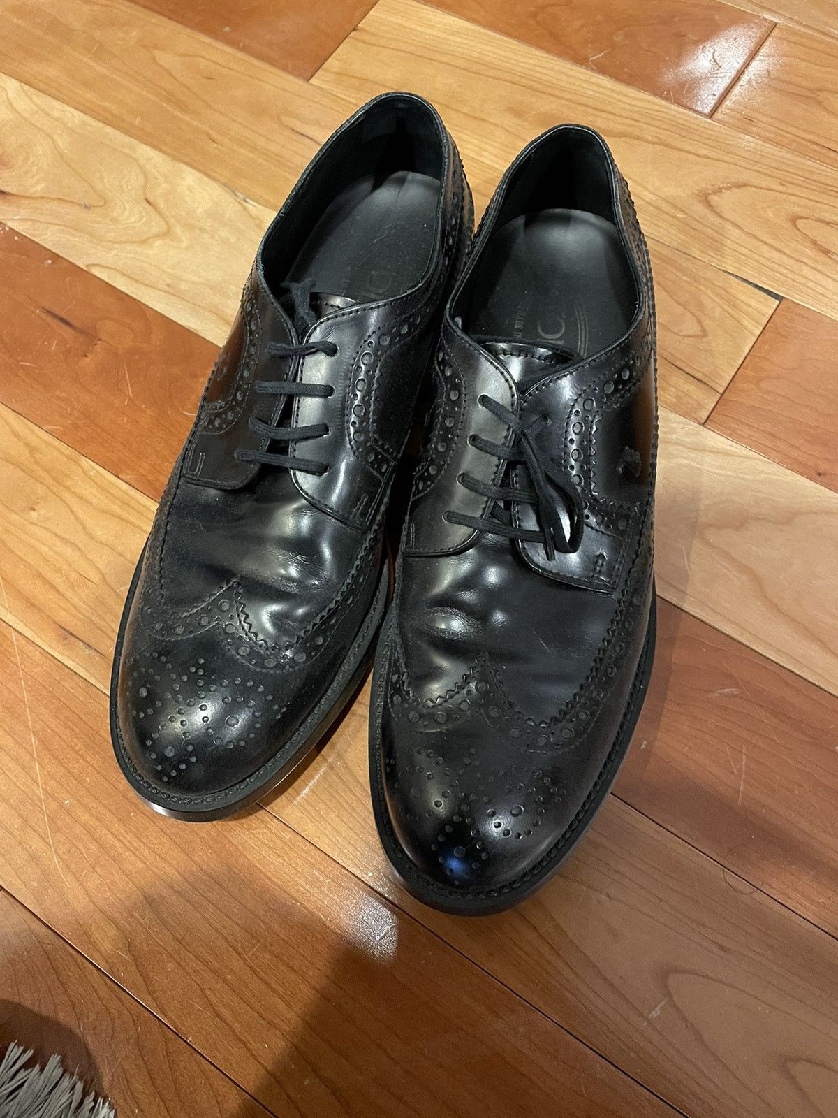 Tod's Tod’s black wingtip leather dress shoes | Grailed