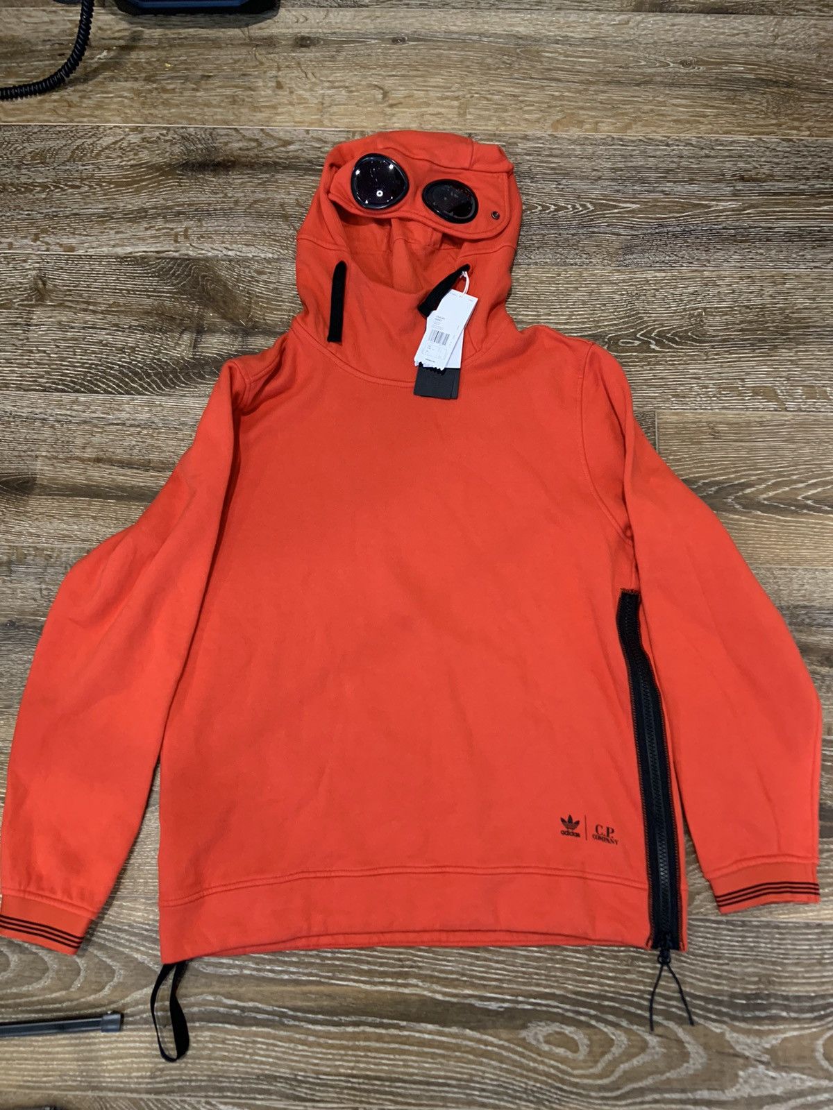 Adidas C.P. Company Cp company adidas orange goggle hoodie Grailed