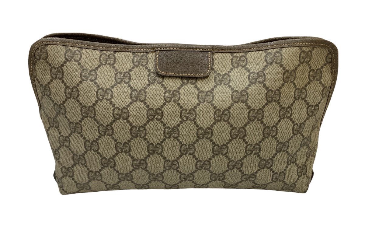 Gucci GG Monogram Clutch Bag shops