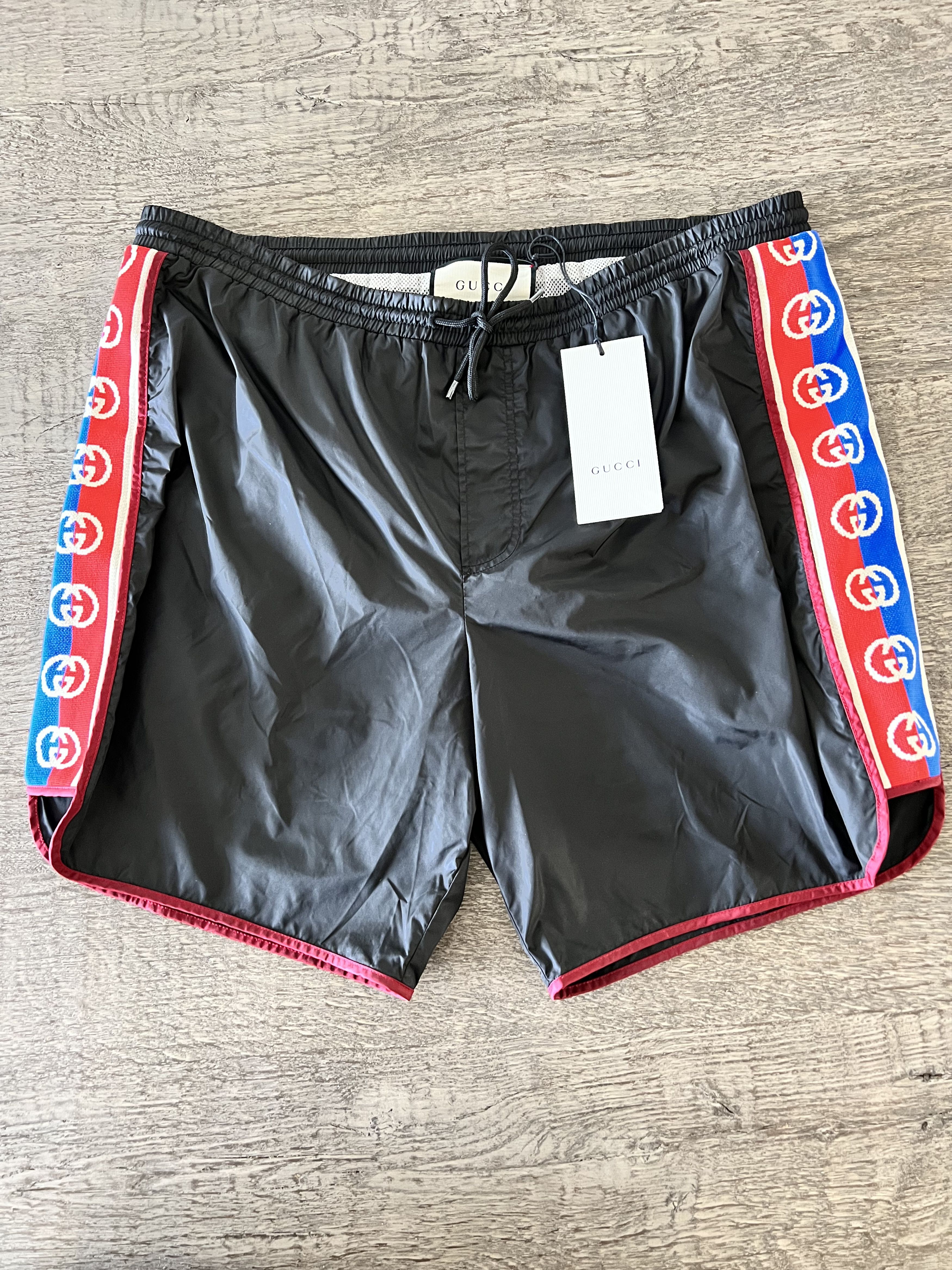 image of Gucci GG Nylon Swim Shorts With Logo Stripe in Black, Men's (Size 34)