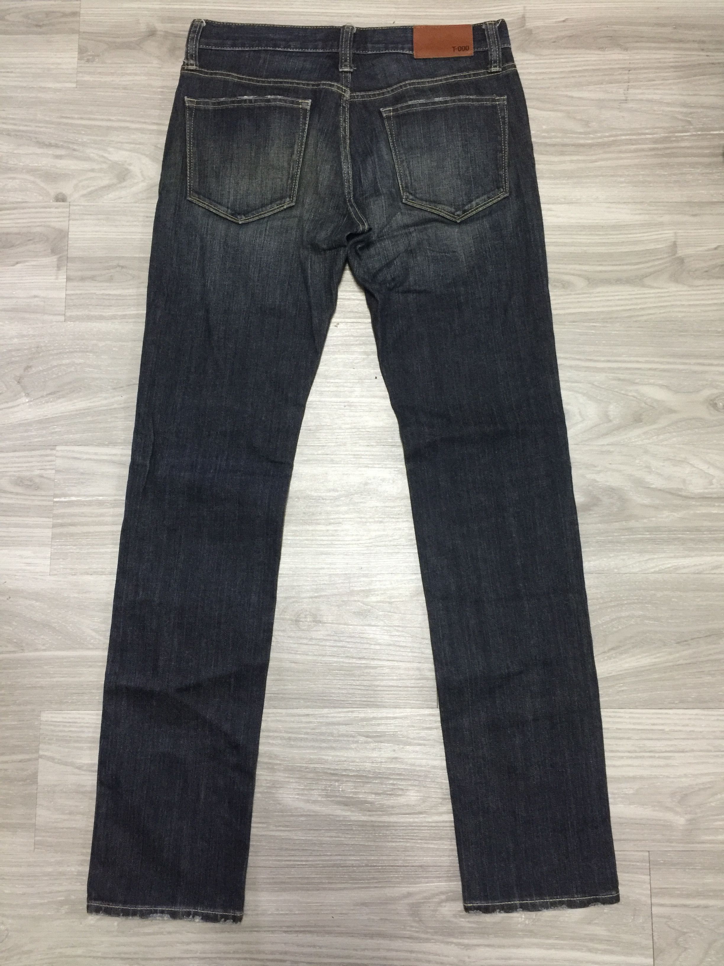 T000 Uniqlo Skinny Fit Tapered Jeans