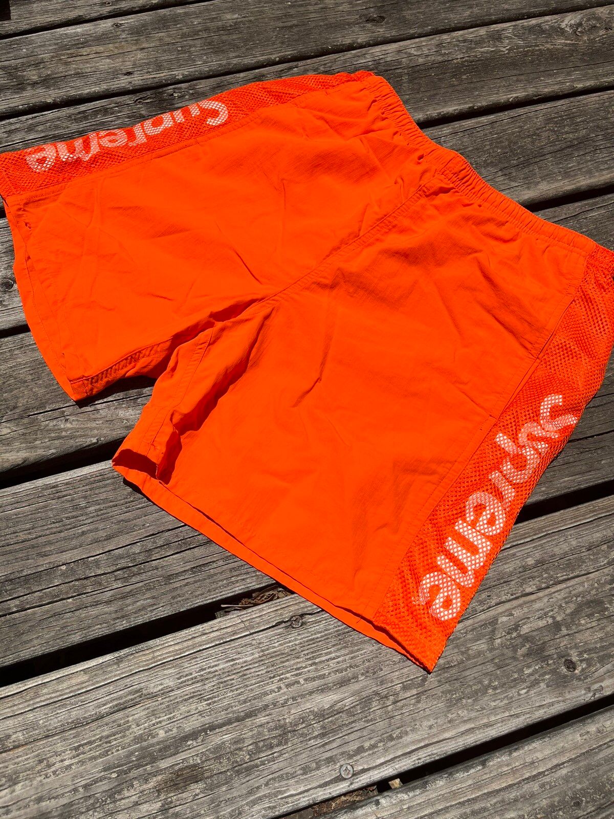Supreme Supreme orange mesh panel water shorts SS   Grailed