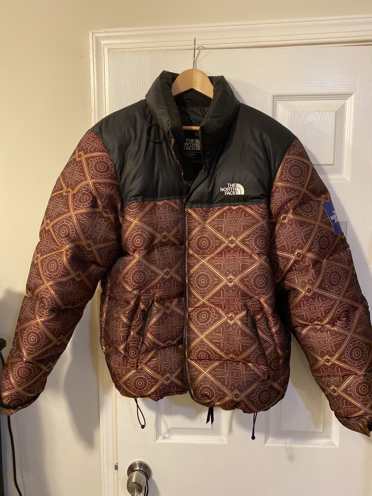 Nuptse jacquard store