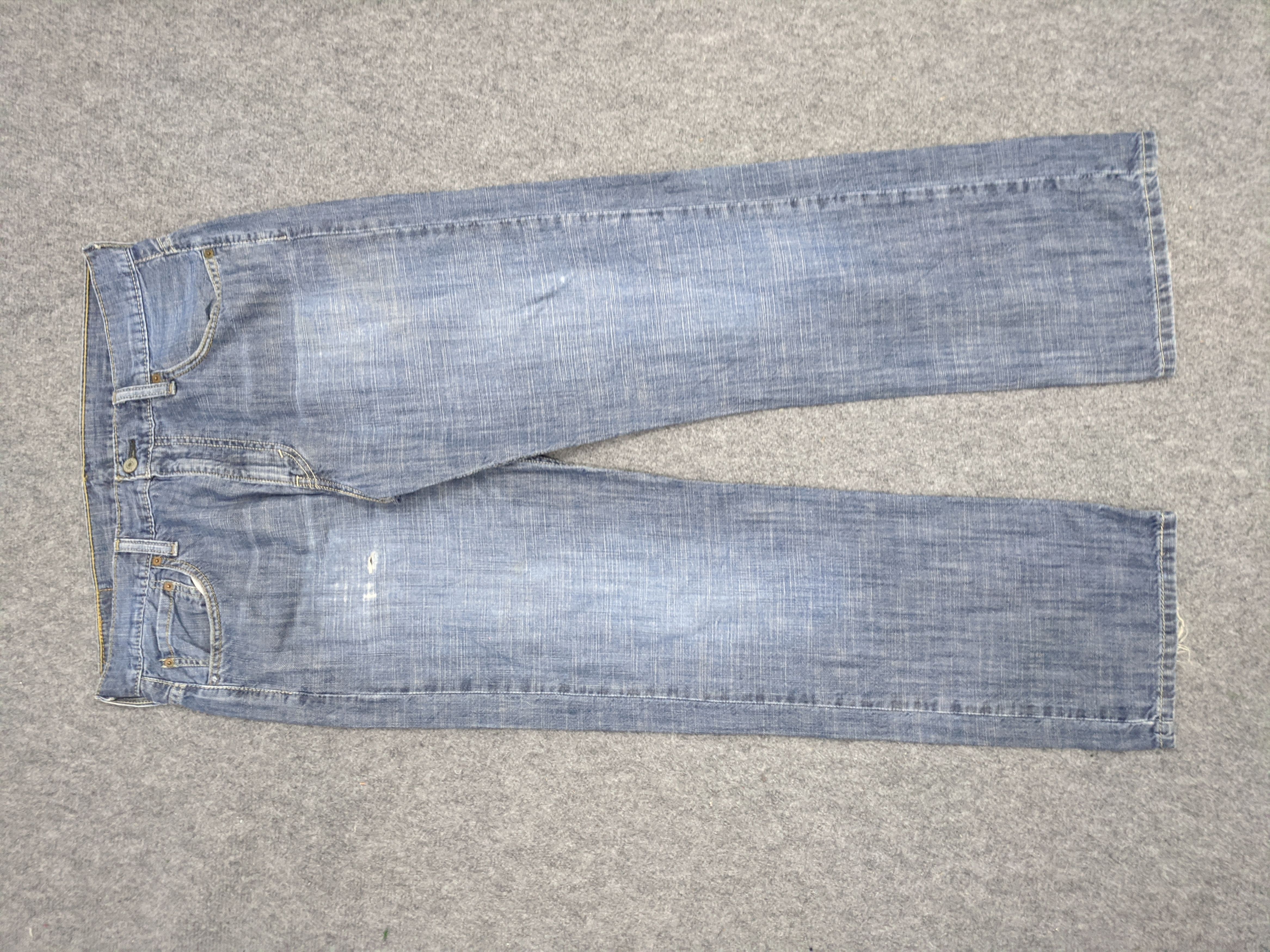 image of Levis 569 Jeans in Blue Denim, Men's (Size 35)