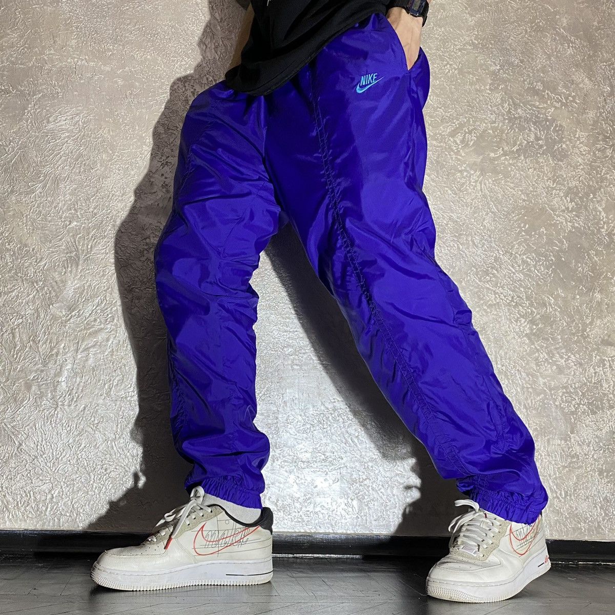 Purple nike track pants outlet