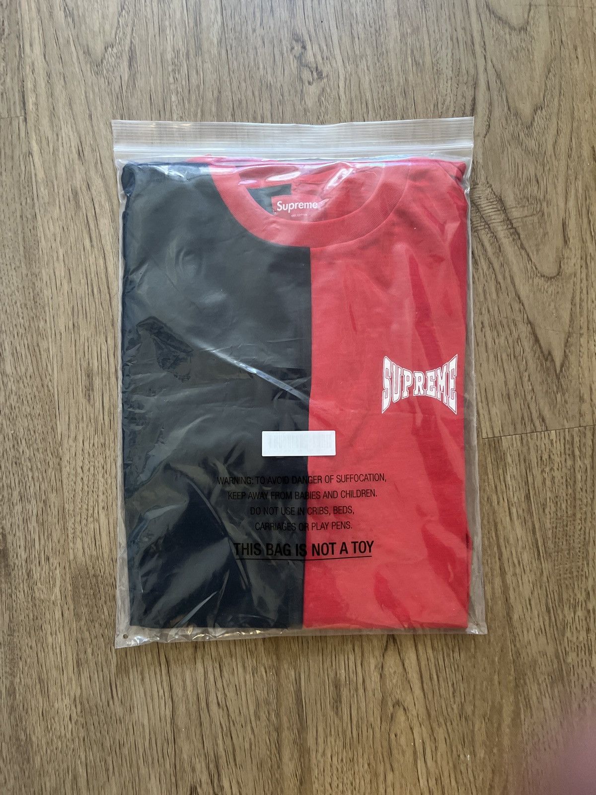 Supreme split ss top