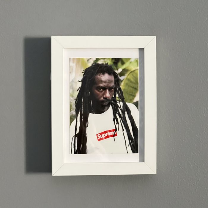 Supreme framed outlet poster