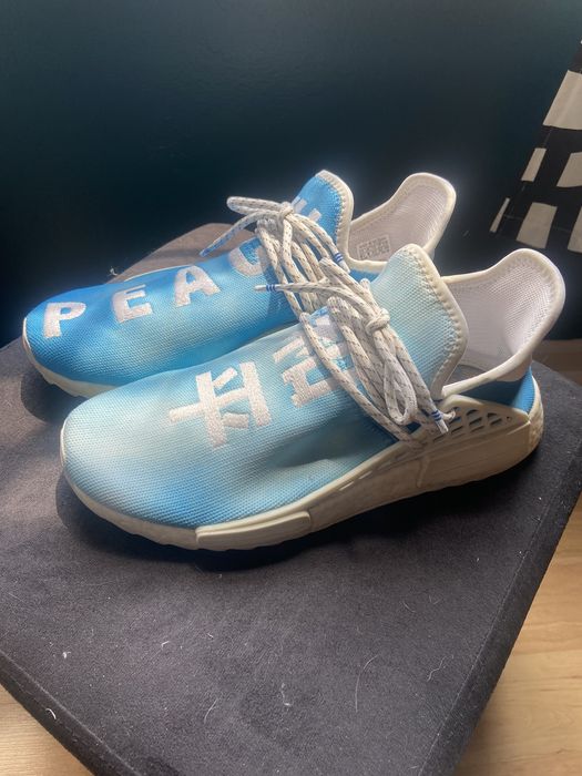 Adidas human race sales peace