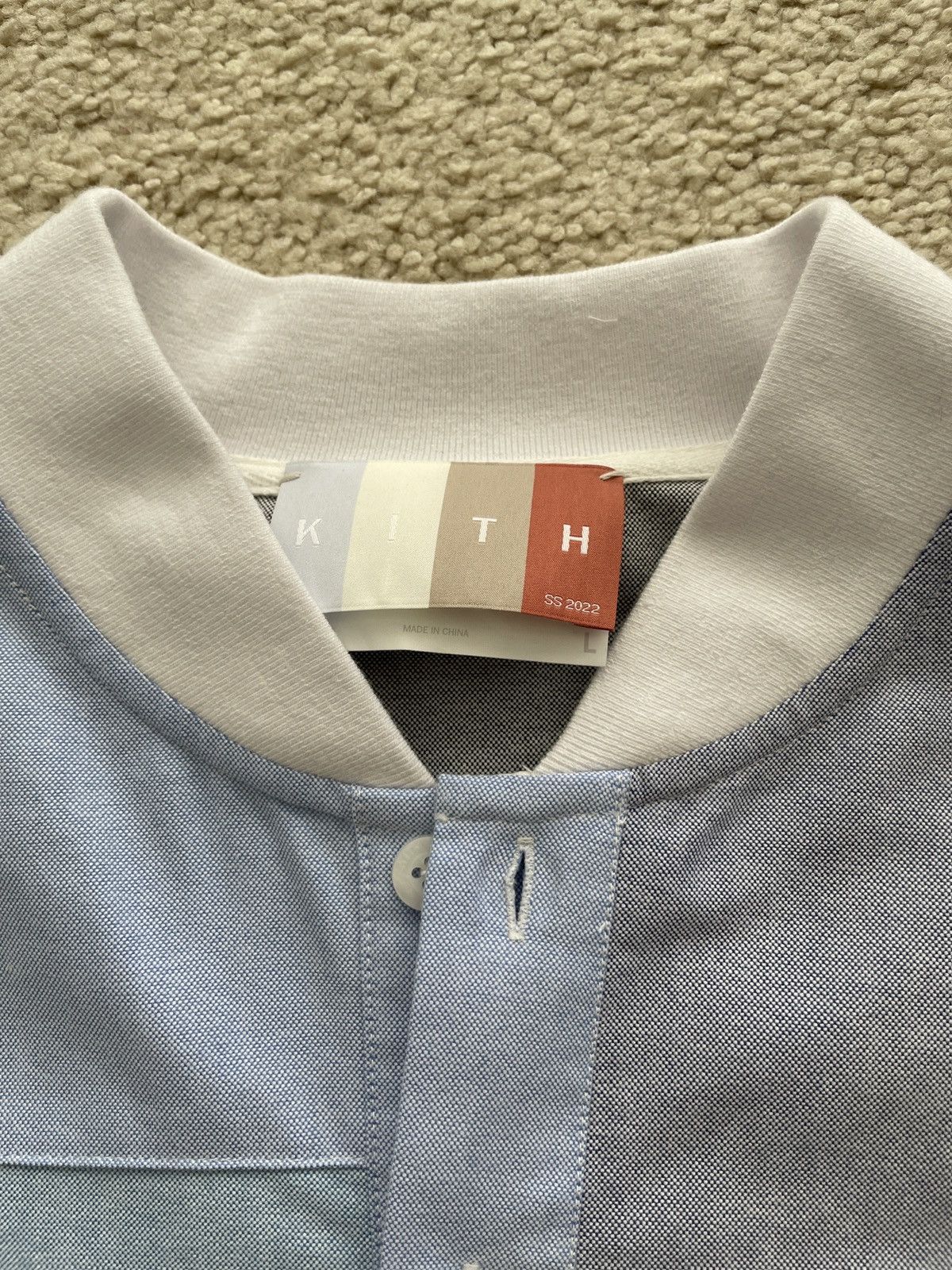 Kith kith patchwork oxford pearson henley pullover | Grailed