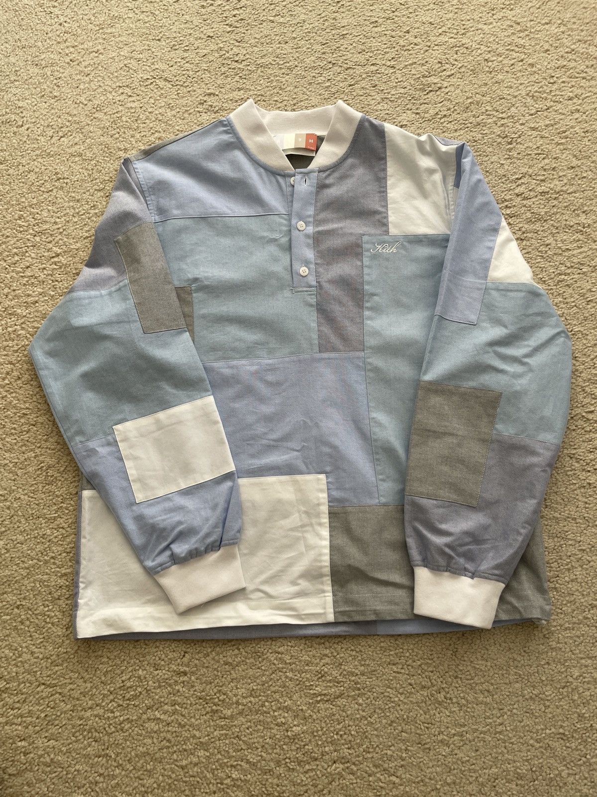 Kith kith patchwork oxford pearson henley pullover | Grailed