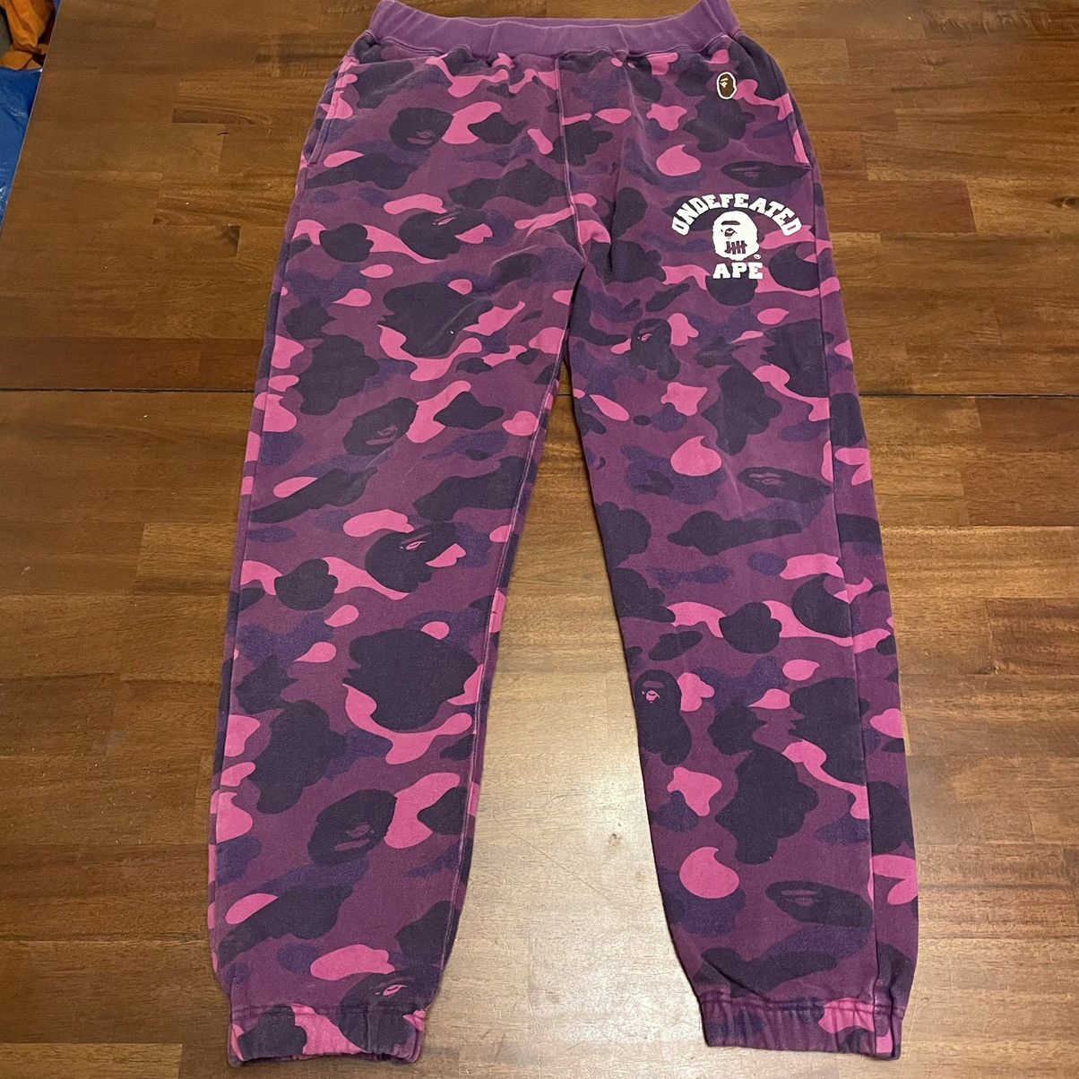 Bape Undefeated Bape bathing ape undefeated sweatpants purple camo small Grailed