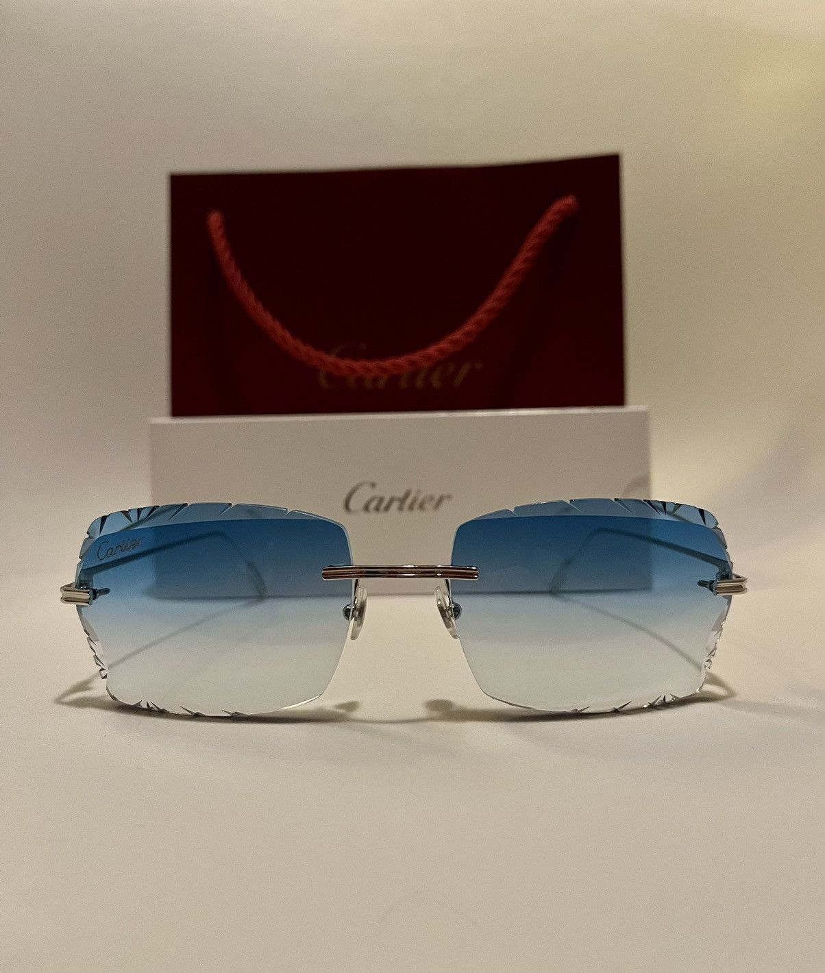 Cartier Cartier rimless Silver Premiere Diamond Cut C decor CT0162O ...