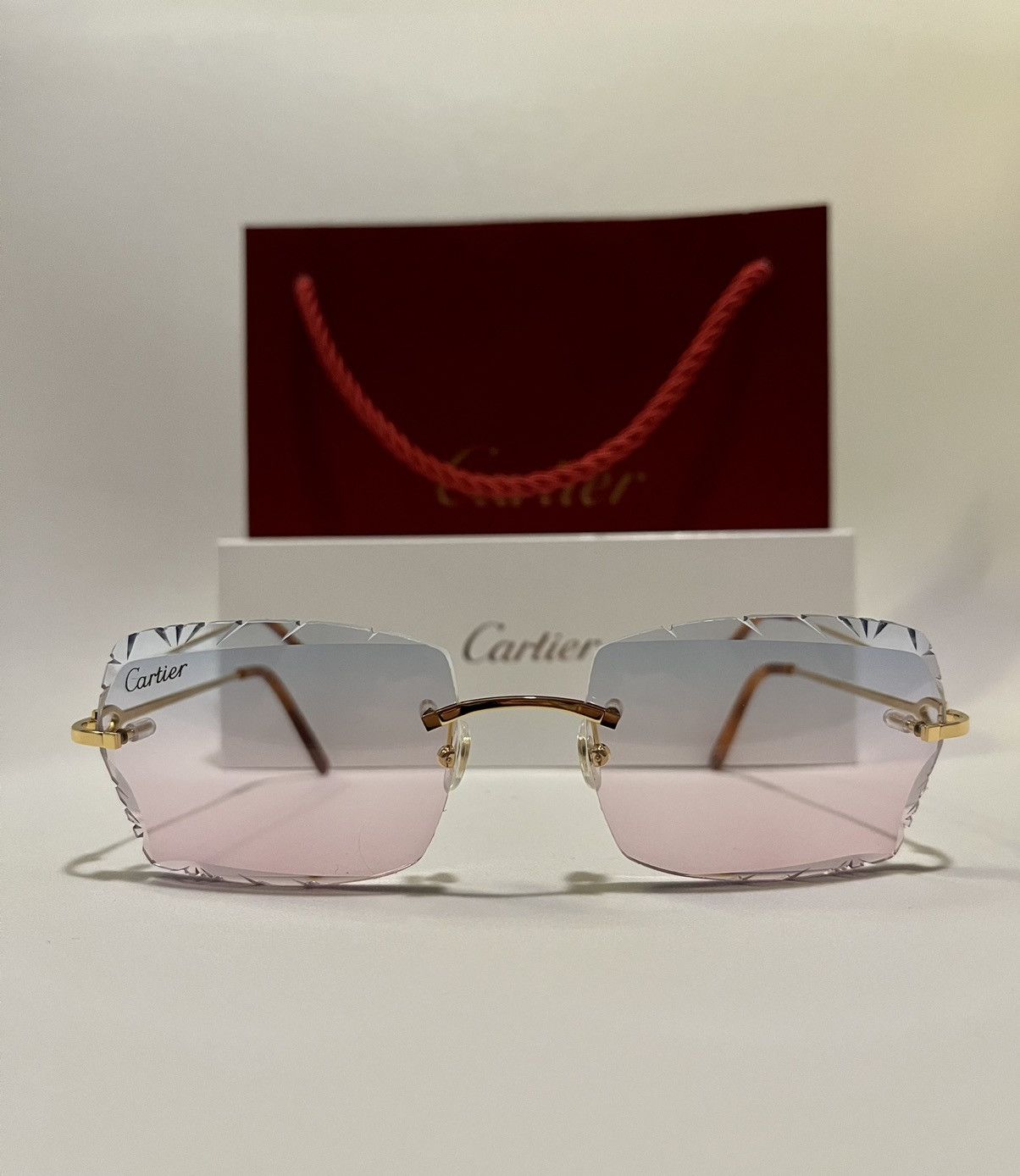 Cartier Cartier rimless Diamond Cut blue/pink small C decor CT00500 ...