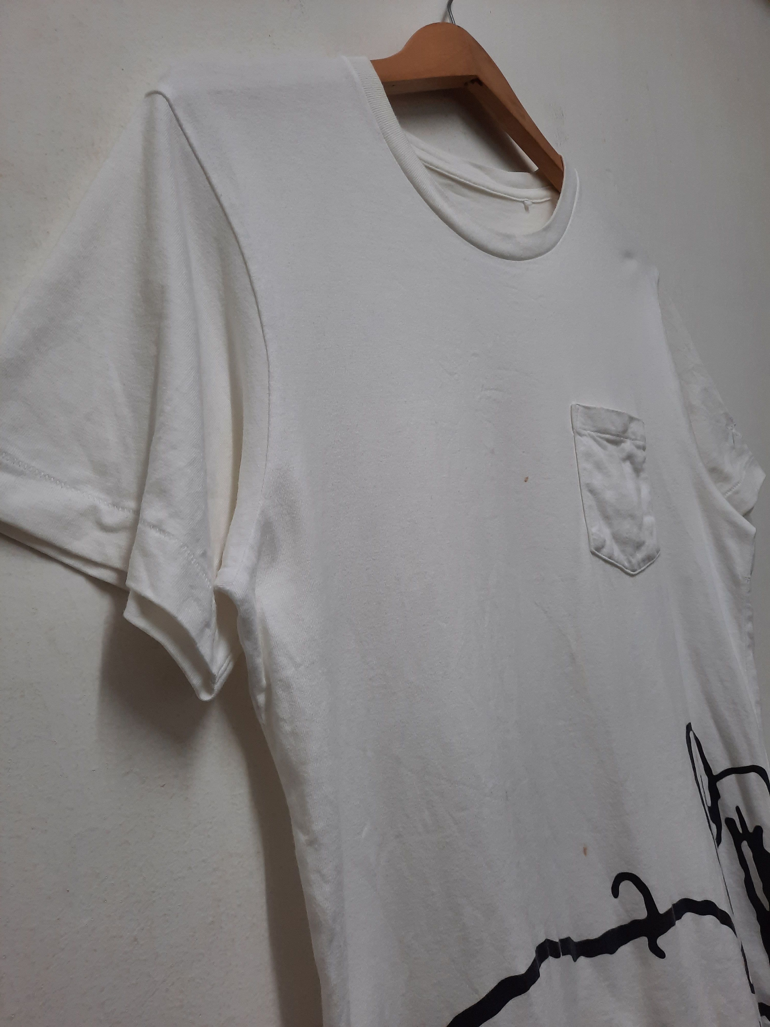 Kaws × Peanuts × Uniqlo KAWS X UNIQLO X PEANUTS T-SHIRT Size US M / EU 48-50 / 2 - 3 Thumbnail