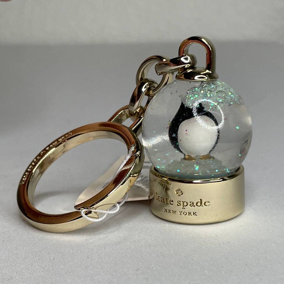 On sale Kate Spade Arctic Friends Penguin Snow Globe Bag Charm