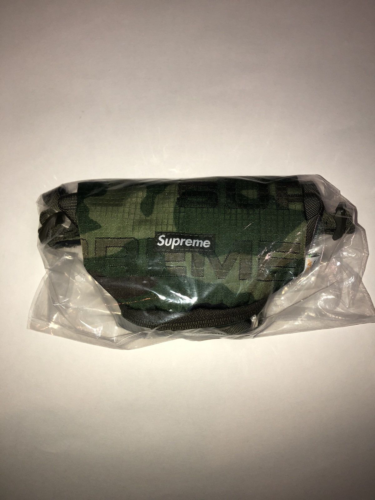 Supreme Supreme neck pouch woodland camo FW 21 | Grailed